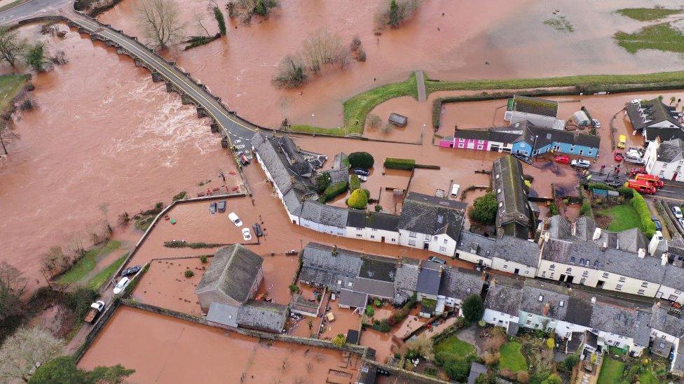 Roads and gardens in Crickhowell, Powys, were turned into lakes, after the river burst its banks