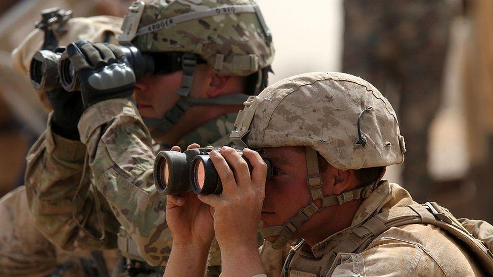 Two soldiers participate in a Jordanian joint military exercise