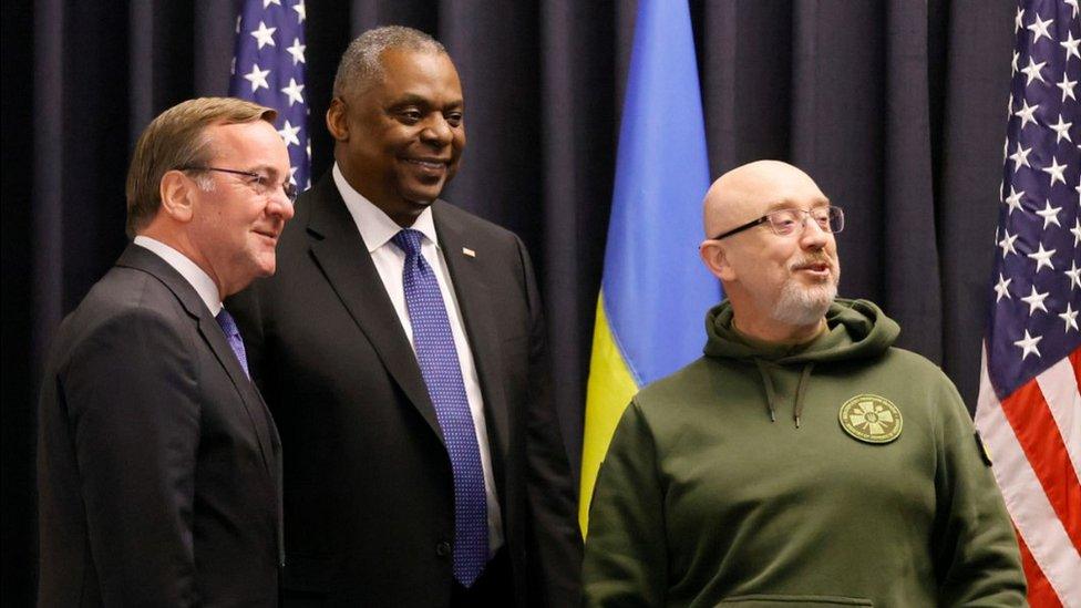 Ukraine's Defence Minister Oleksii Reznikov (R) with US Defence Secretary Lloyd Austin (C) and German Defence Minister Boris Pistorius