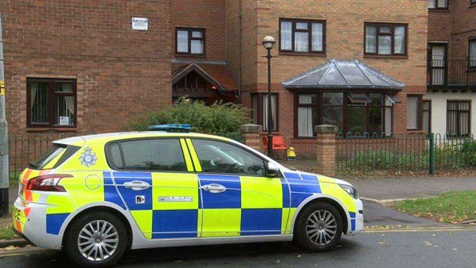 Police car at Charles Brady Court