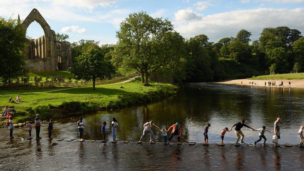 Bathers enjoying Ilkley hope River Wharfe this summer