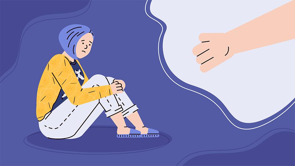 Illustration of person sitting alone