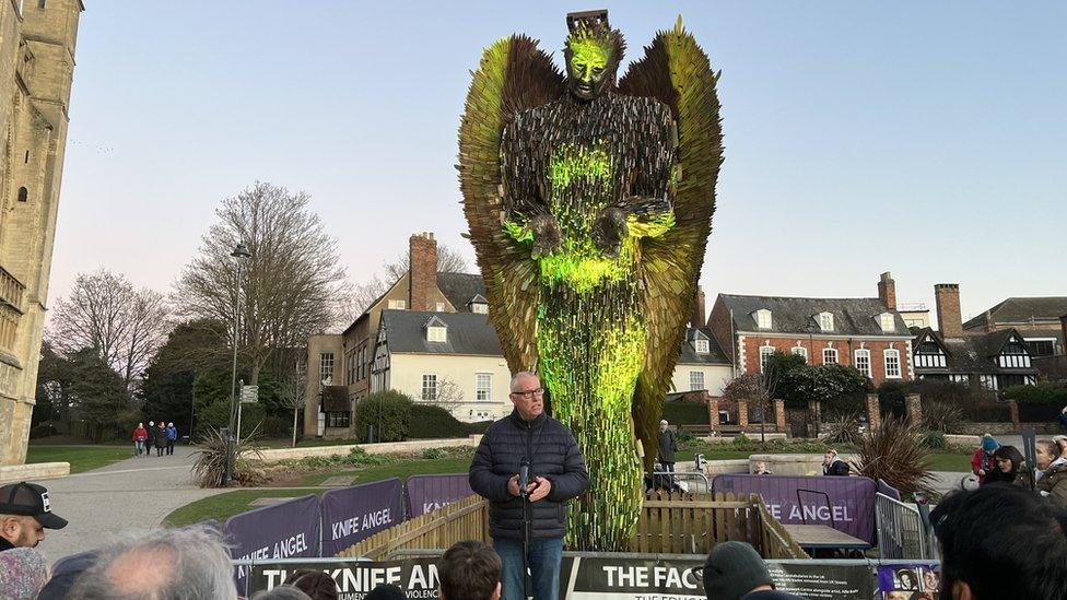 Nick Gazzard speaks at vigil marking the end of the Knife Angel statue being on display in Gloucester.