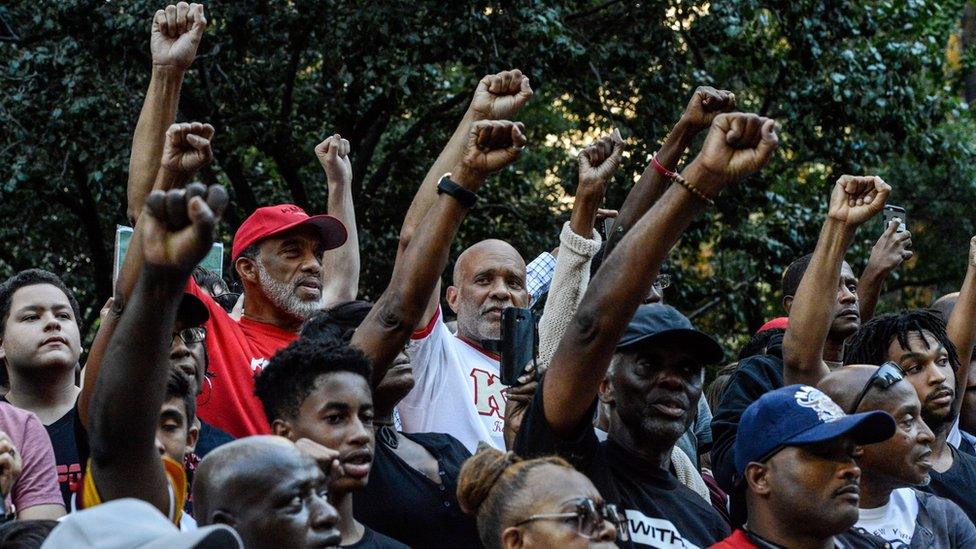 People participate in a protest against the NFL and in support of Colin Kaepernick in New York