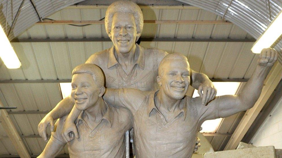 Clay model of statue of Laurie Cunningham, Brendon Batson and Cyrille Regis