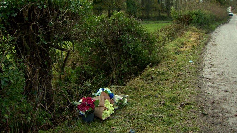 Flowers at the site of the crash