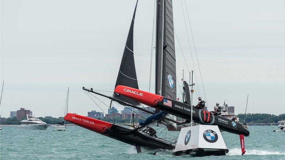 Oracle Team USA boat lifting out of water