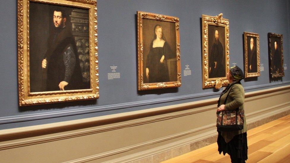 A woman examines the artist's Portrait of a Widow