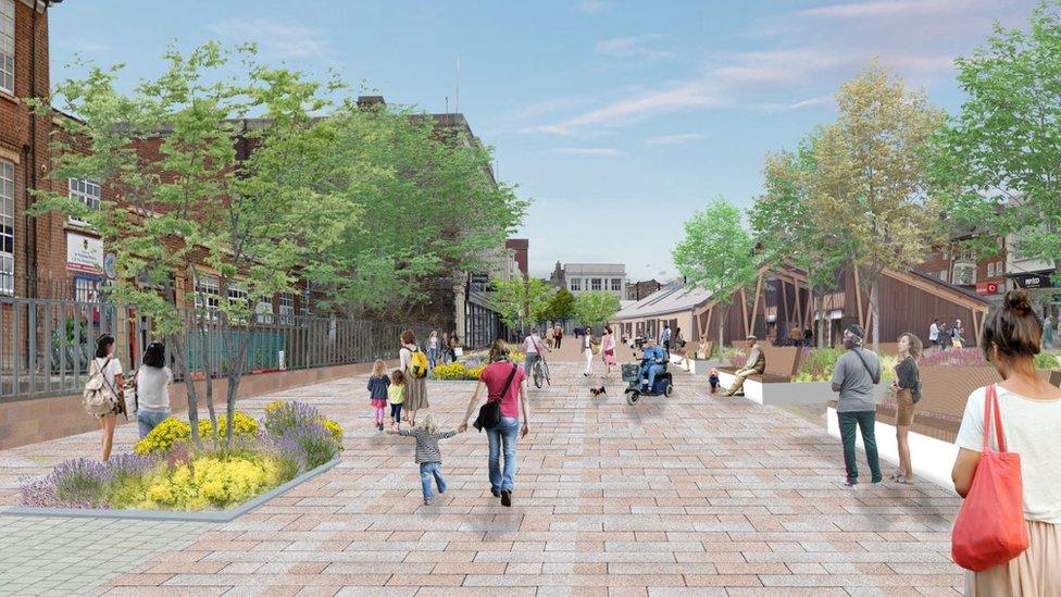 An artist's impression of the regeneration of Great Yarmouth town centre, showing people enjoying the outside