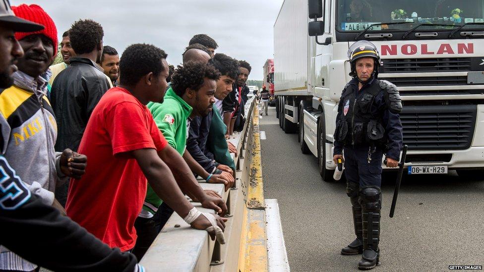 Migrant beside the road in Calais