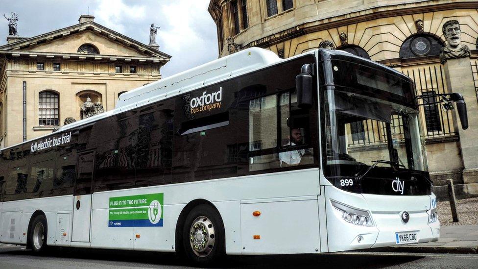 a white single decker bus