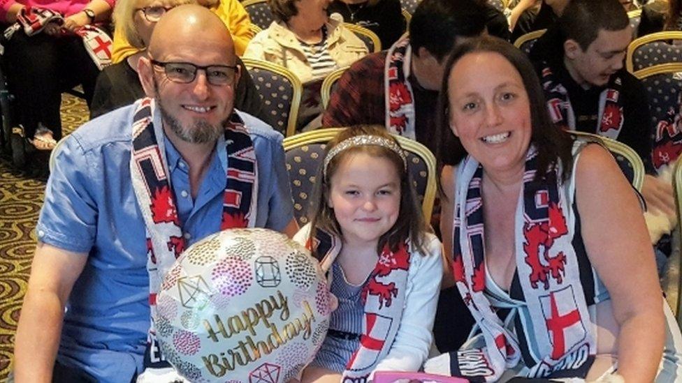 Paige Brindle with her parents Terry and Tanya