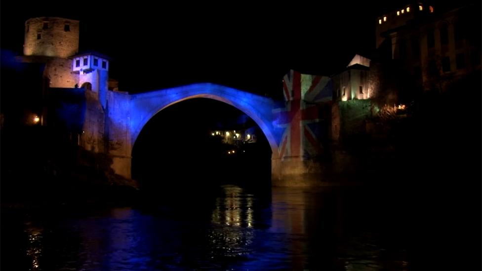 Old Bridge in Mostar illuminated in United Kingdom's flag colours.