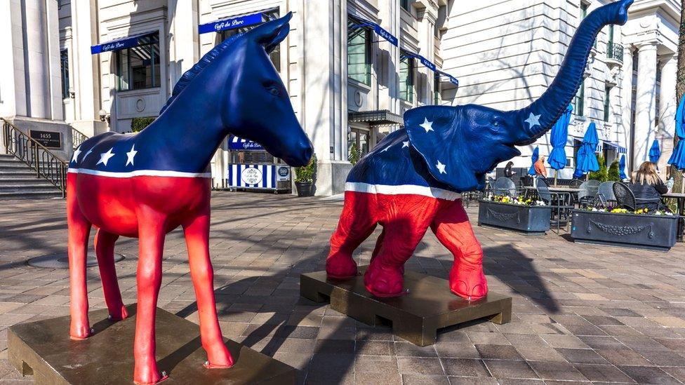 Democratic Mule and Republican Elephant statues symbolize American 2-part political system