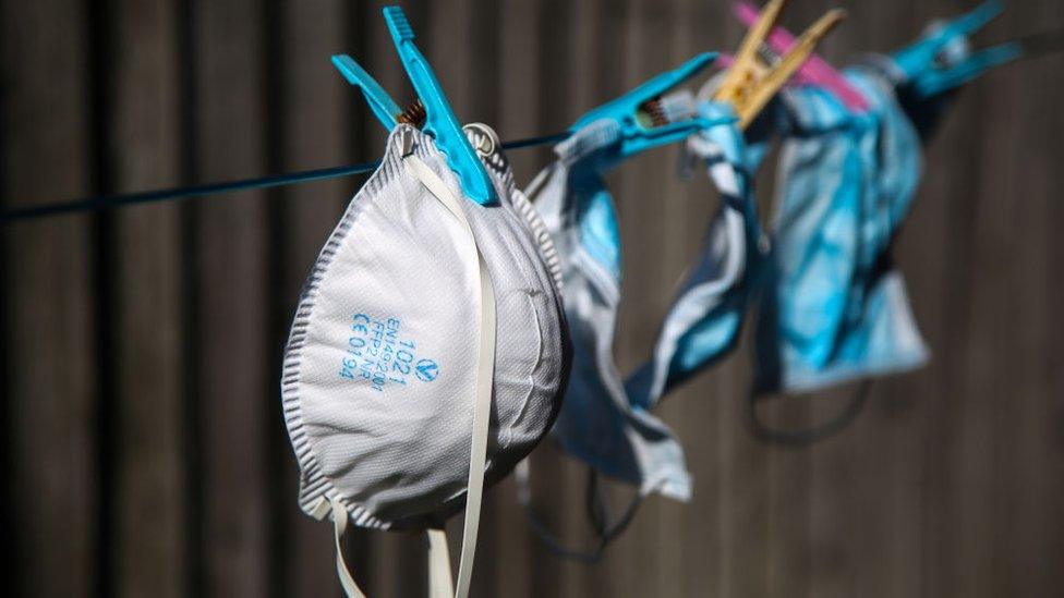 PPE hanging on washing line