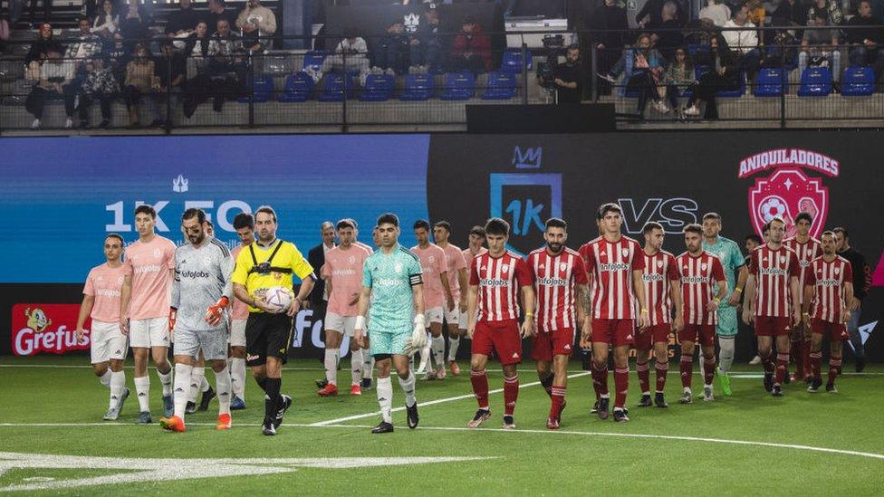 Teams walking out on the pitch