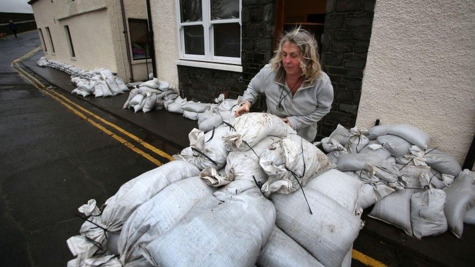 Clearing up sandbags in Peebles