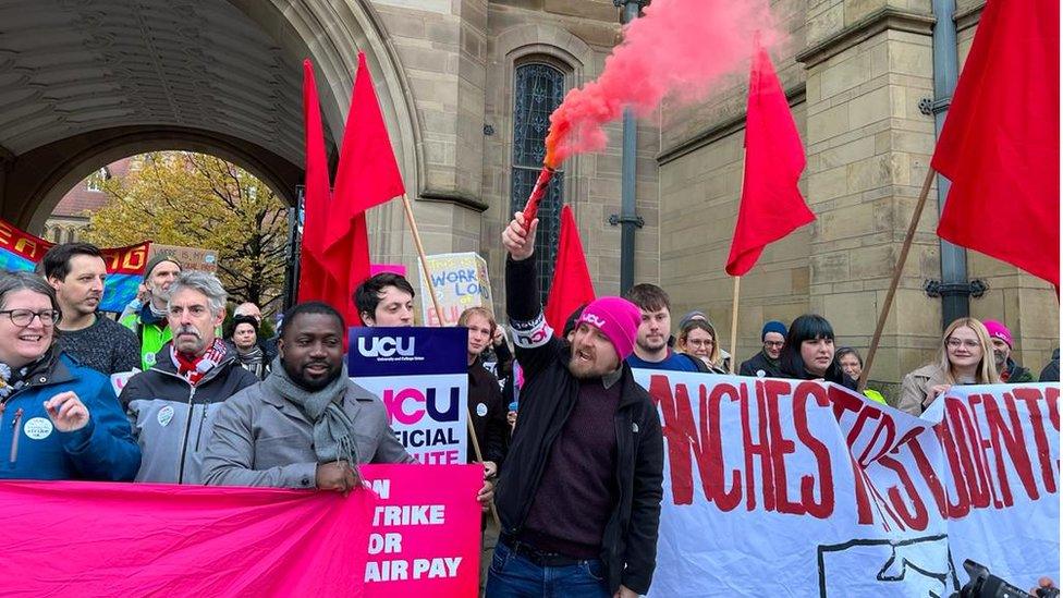 Staff and students protesting outside the University of Manchester