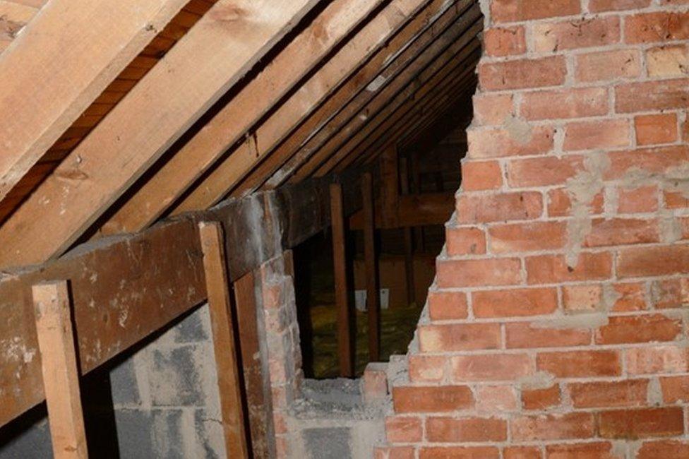 Broken wall in loft