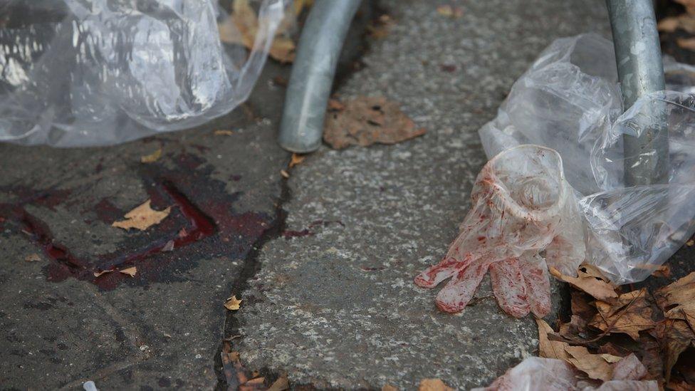 Bloody medical glove outside the Bataclan, Paris, on 14 November, 2015