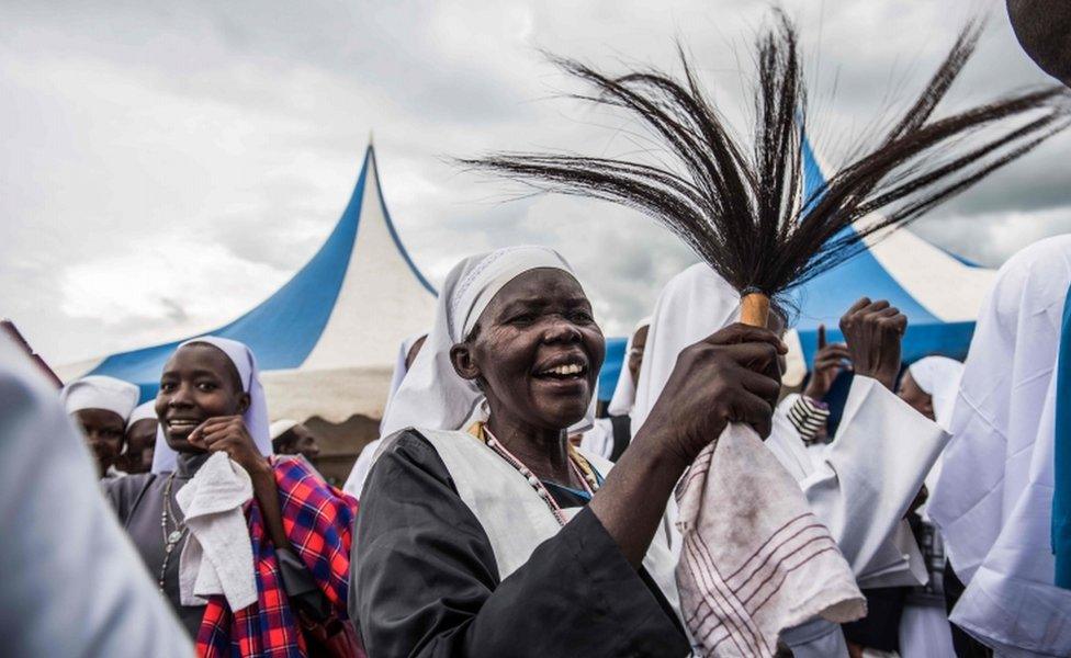 Members of the sect of Legio Maria (Latin for Legion of Mary) attend the funeral service for one of the sects founders, Cardenal Wilson Oweno Obimos, in the western Kenya town of Kisumu, on 9 April 2016