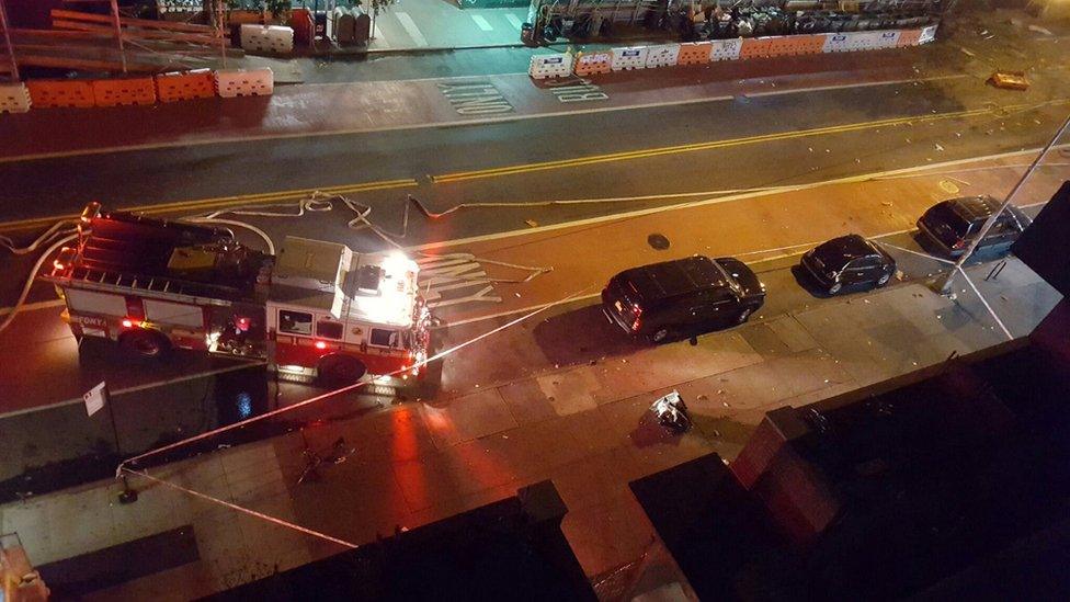 Fire rescue crews block off the street near the scene of an explosion in the Chelsea, New York, on 17 September 2016