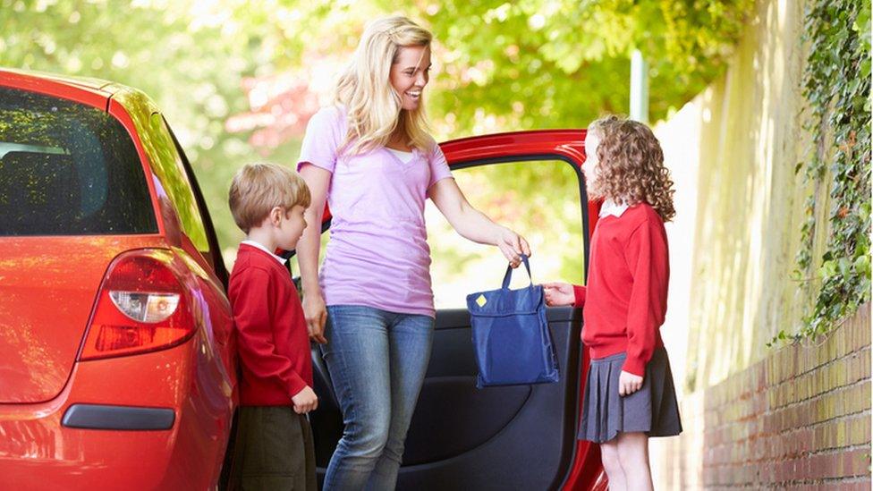 Children being driven to school