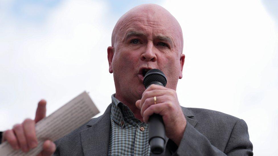 Mick Lynch, general secretary of the RMT rail union, speaks at a rally