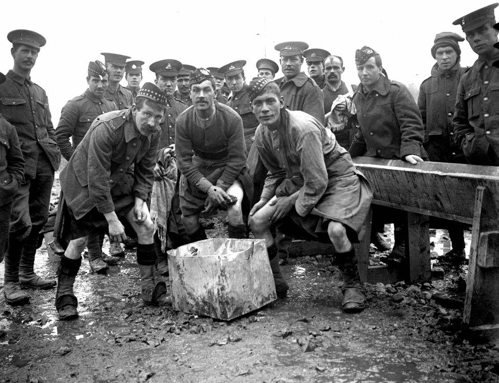 World War I, Scottish soldiers doing the washing up on the French front, 1914.