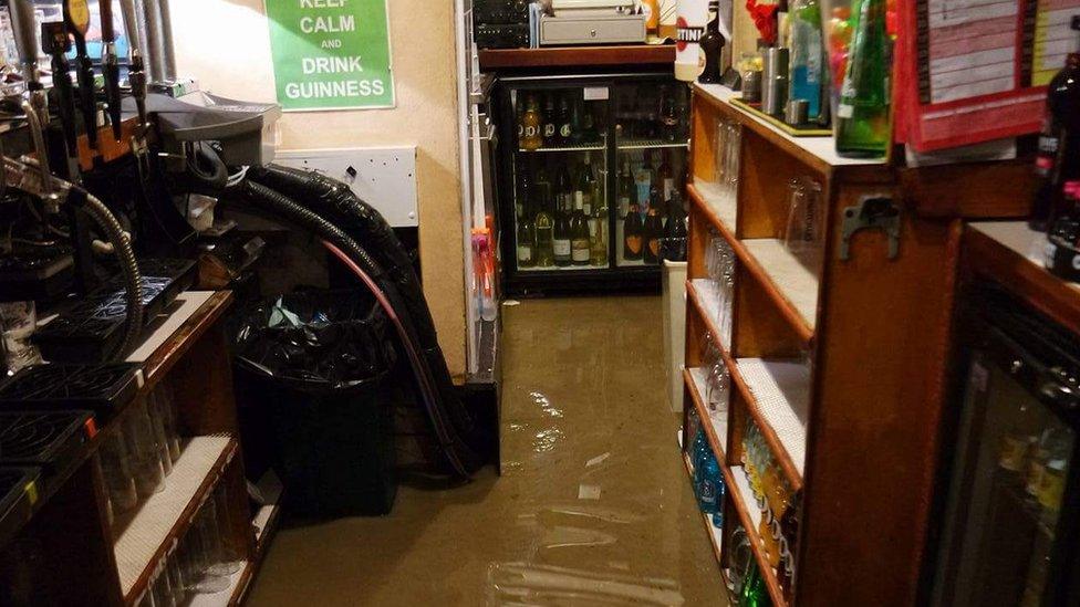 Flood water behind the bar at the Union Inn