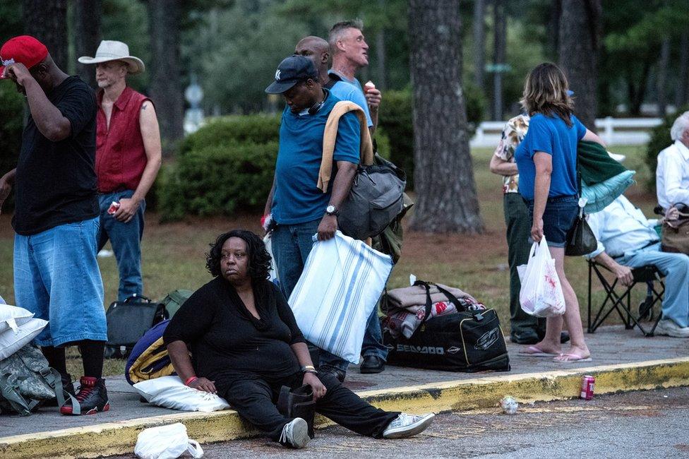 People evacuate ahead of the forecasted landfall of Hurricane Florence as they seek shelter at Emma B Trask Middle School in Wilmington, North Carolina, USA, 11 September 2018