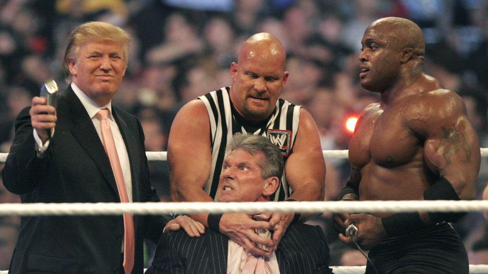 Donald Trump prepares to shave the head of World Wrestling Entertainment chairman Vince McMahon (centre, seated), during WWE's Wrestlemania in April 2007. Footage from the event was altered and showed up on Reddit, and was later tweeted by Trump