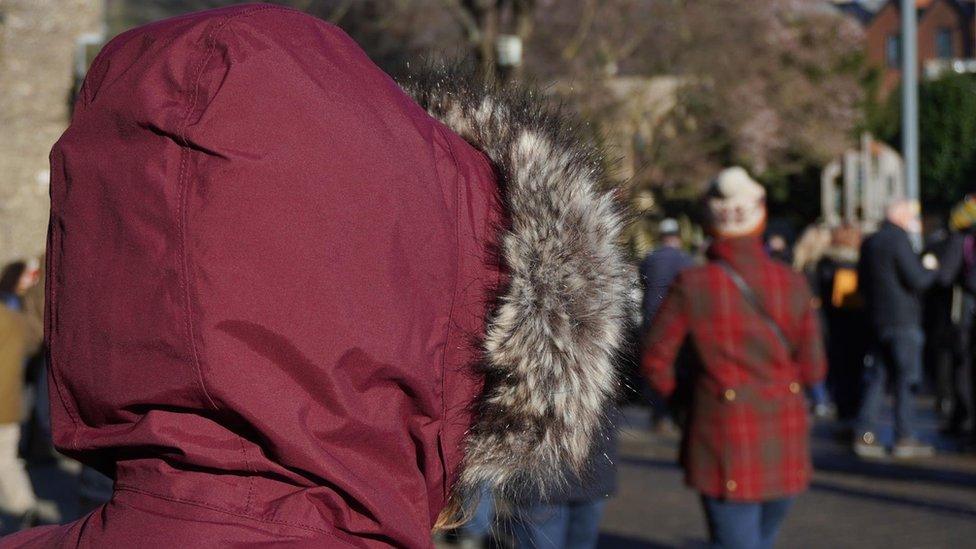 Woman with back to camera