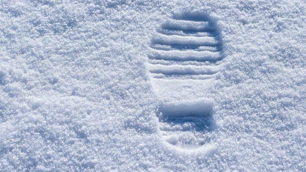 A footprint in the snow (library picture)