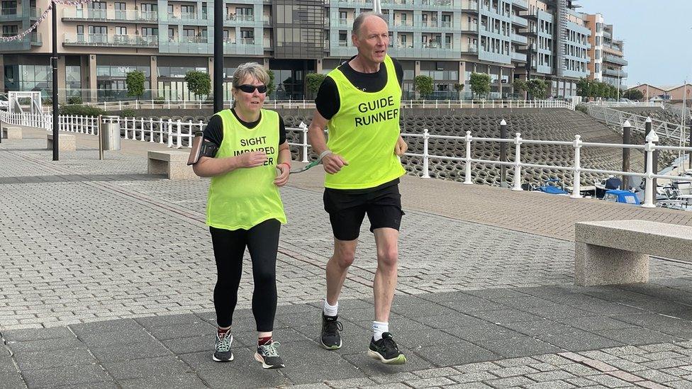 Runner Jenny Stafford and guide runner Alastair Christie