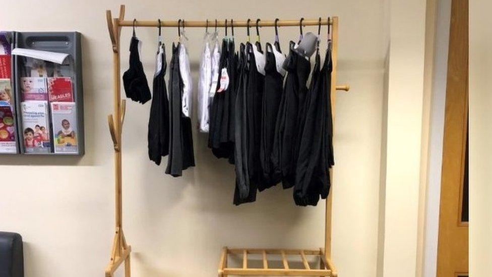 Uniform hanging on a clothing rail