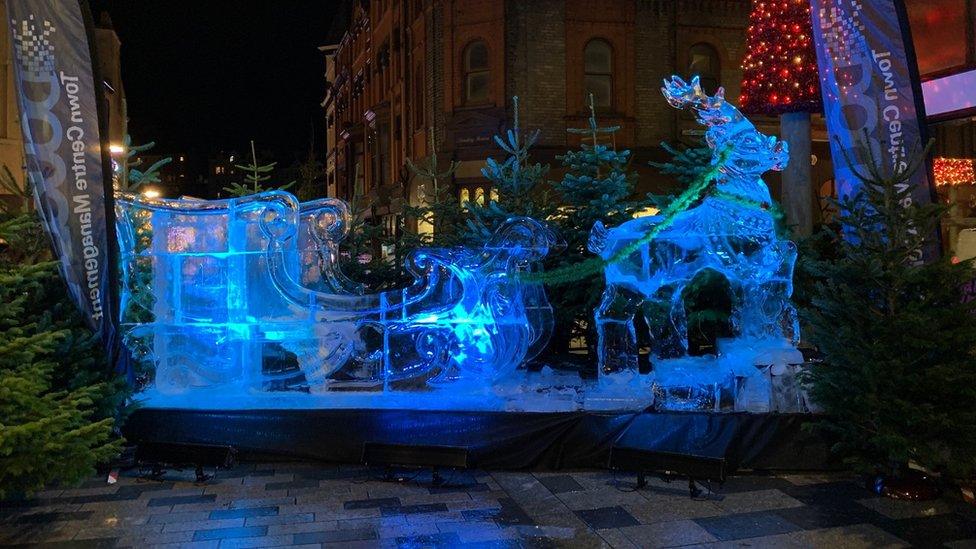 Ice sculpture of sleigh and reindeer