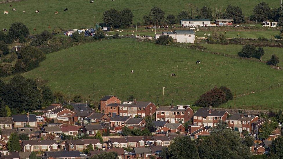 housing estate near Pennines moorland