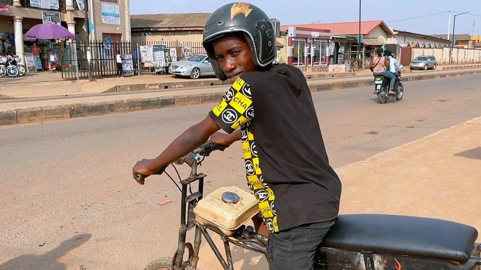 Adewale Qoyum on his bike