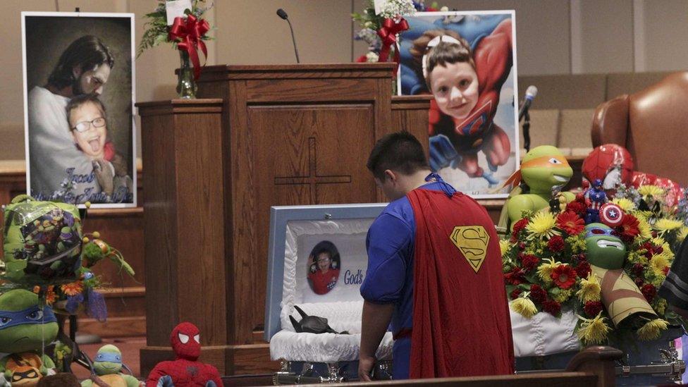 Superman pays respects to Batman