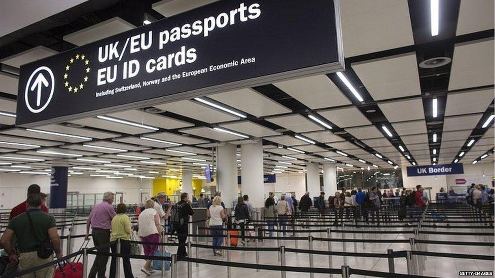 People queuing up for passport control at Heathrow airport