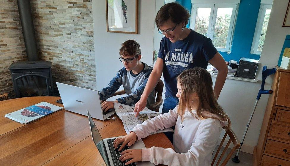 Susana Fuertes, at home with her children, Mateo and Isabel