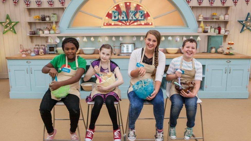 Kids-stirring-their-cake-mixture-in-the-Bake-Off-tent.