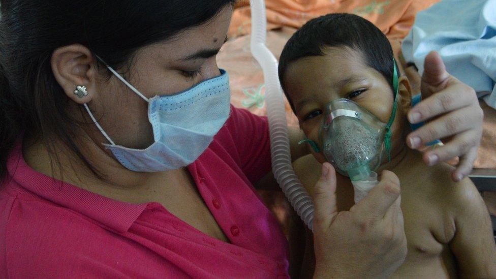 Santiago Ortiz and his mother, Kelly