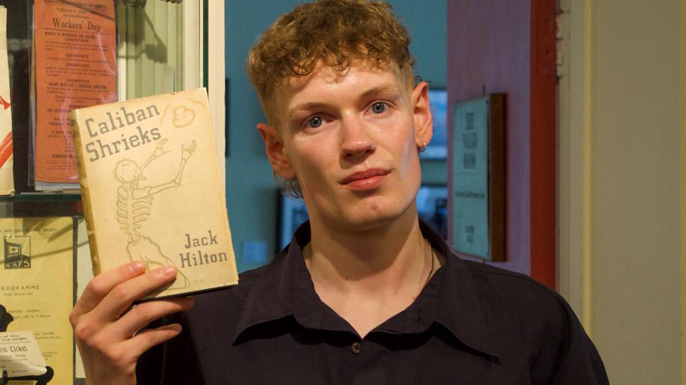 Jack Chadwick with a copy of Caliban Shrieks