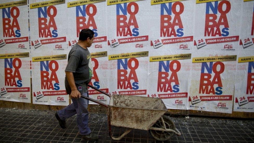 Banners in Buenos Aires called for anti-Obama protests on the 40th anniversary of the military coup