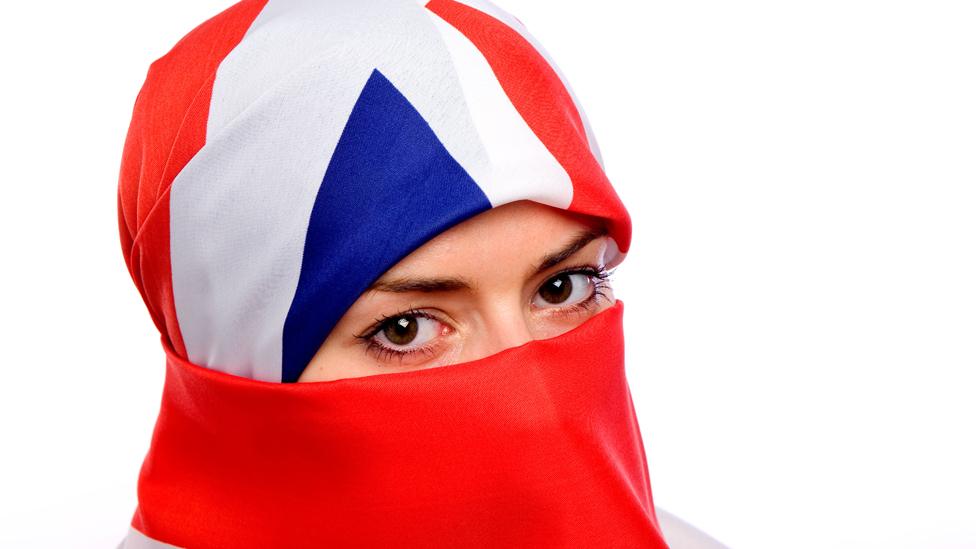 Woman wearing a union flag as a headscarf