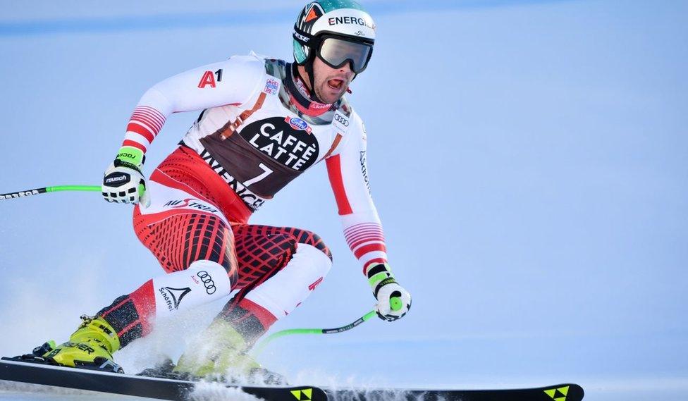 Austria's Vincent Kriechmayr reacts as he crosses the finish line after competing in the Men's Downhill of the Lauberhorn during the FIS Alpine Ski World Cup, on January 19, 2019, in Wengen