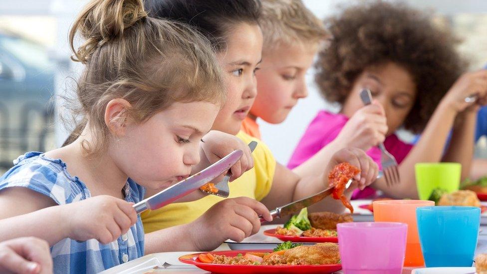 Children eating school meals