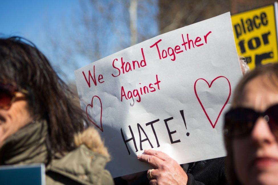 a sign against hate